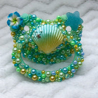 Green and Blue Seashell Seconds BP Paci